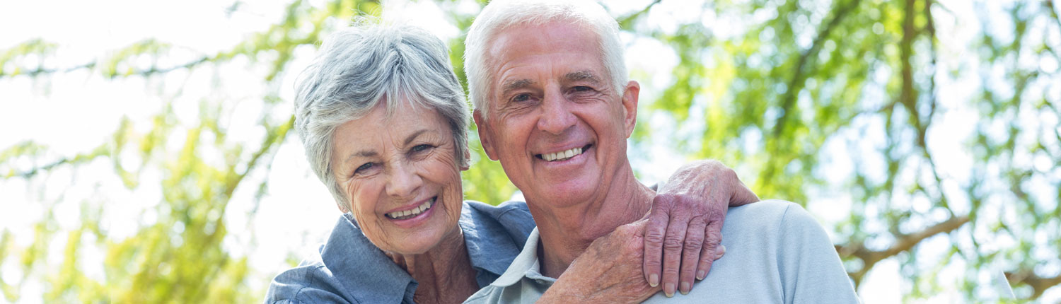 Senior Couple Smiling in a Park