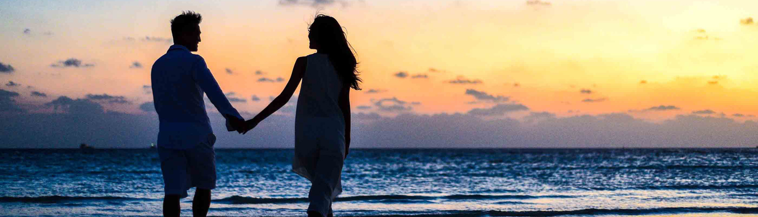 Couple on the Beach at Sunset